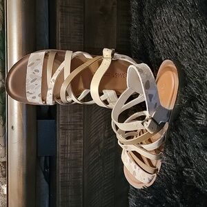 Tom's Sephina sandal.  Size 6.5.  Beige abstract cow print.